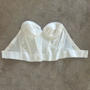A white corset top.